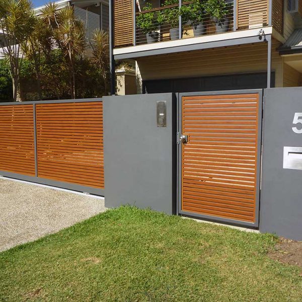 Front-slat-fence-sliding-driveway